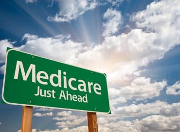 A road sign that says ‘Medicare just ahead.”